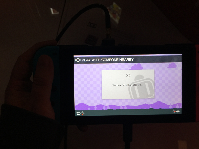 Yes, this is the best picture I could get of me holding the Switch in my hand. It was dark, and I didn’t want to make everyone else wait on me.